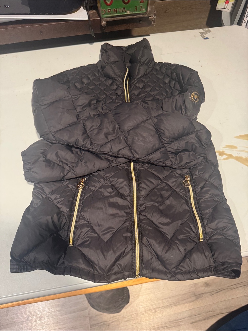 Michael Kors Black puffer jacket with Gold Hardware